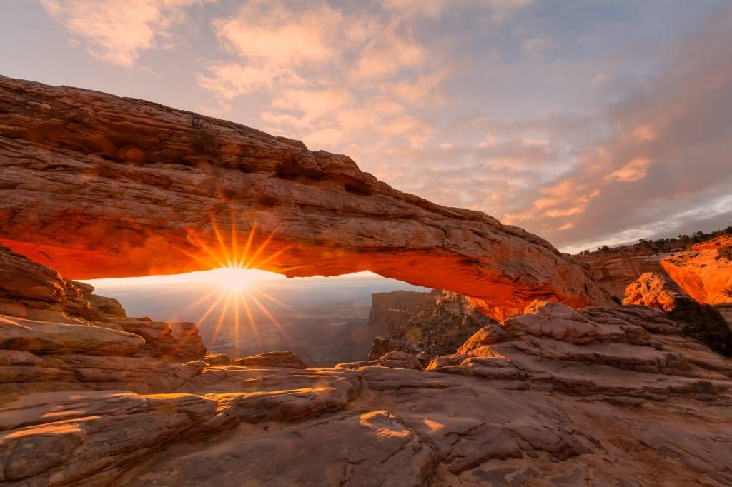 Sunset under rocks