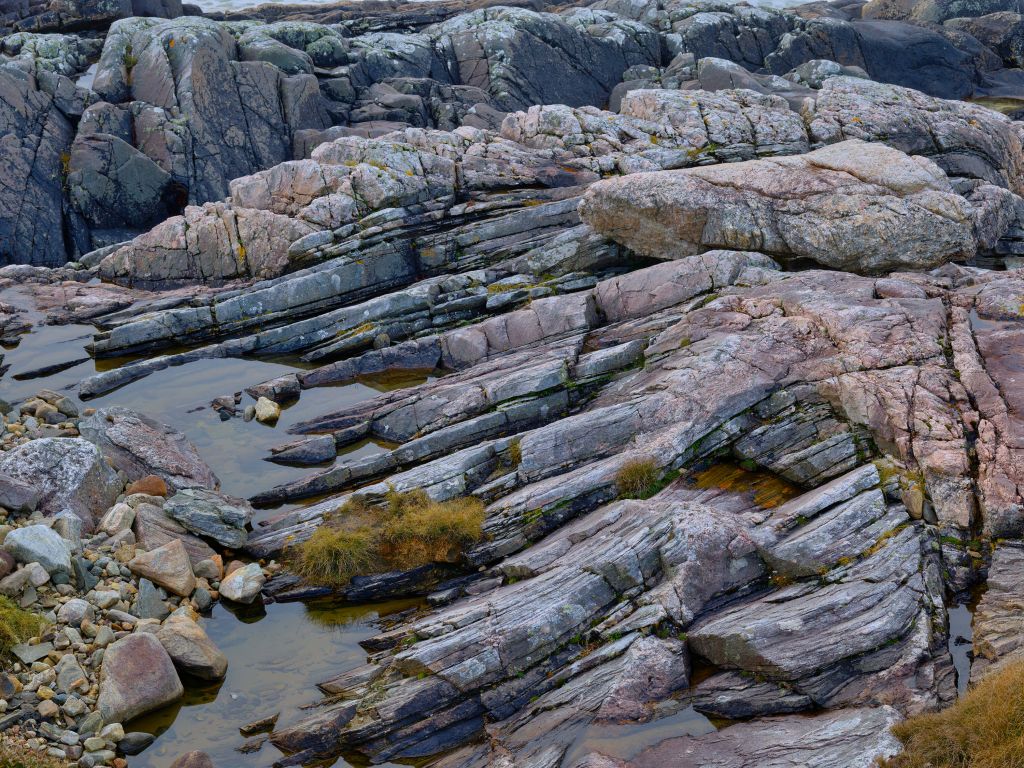 Layered rocks and water