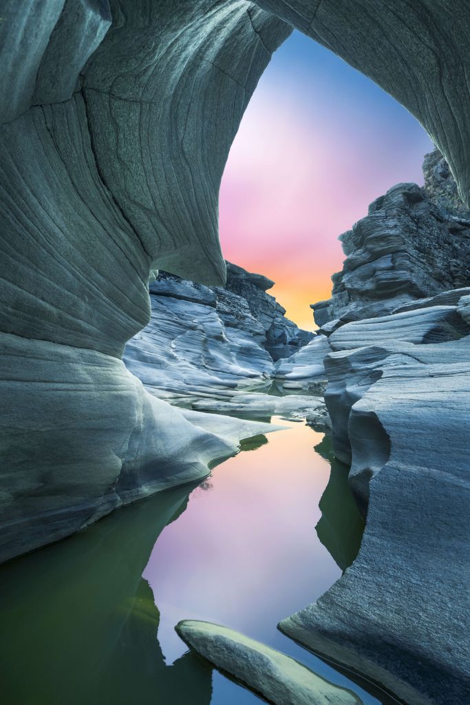 Cave with coloured sky