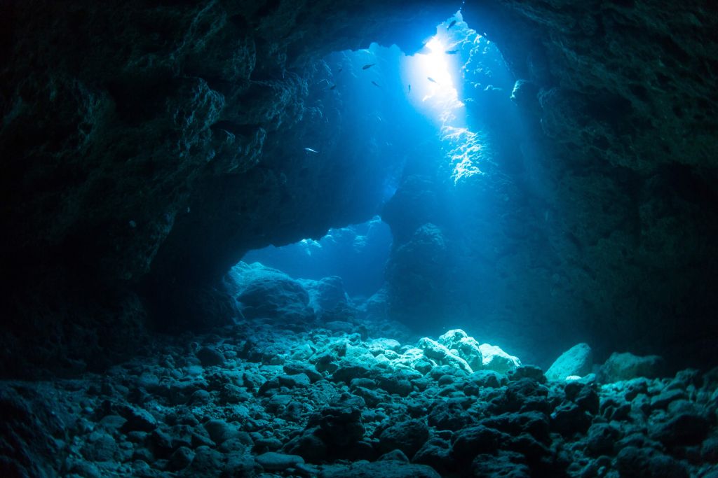 Dark cave in the ocean