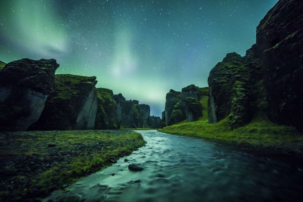 Northern lights above the mountains