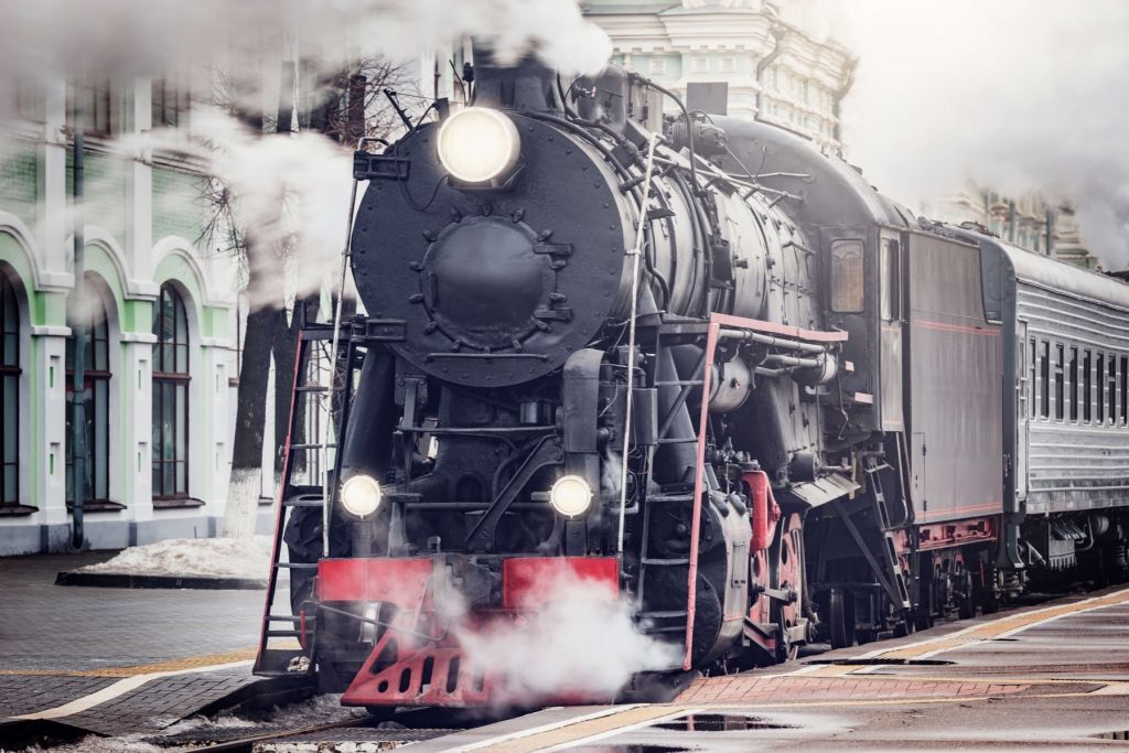 Steam train with steaming steam