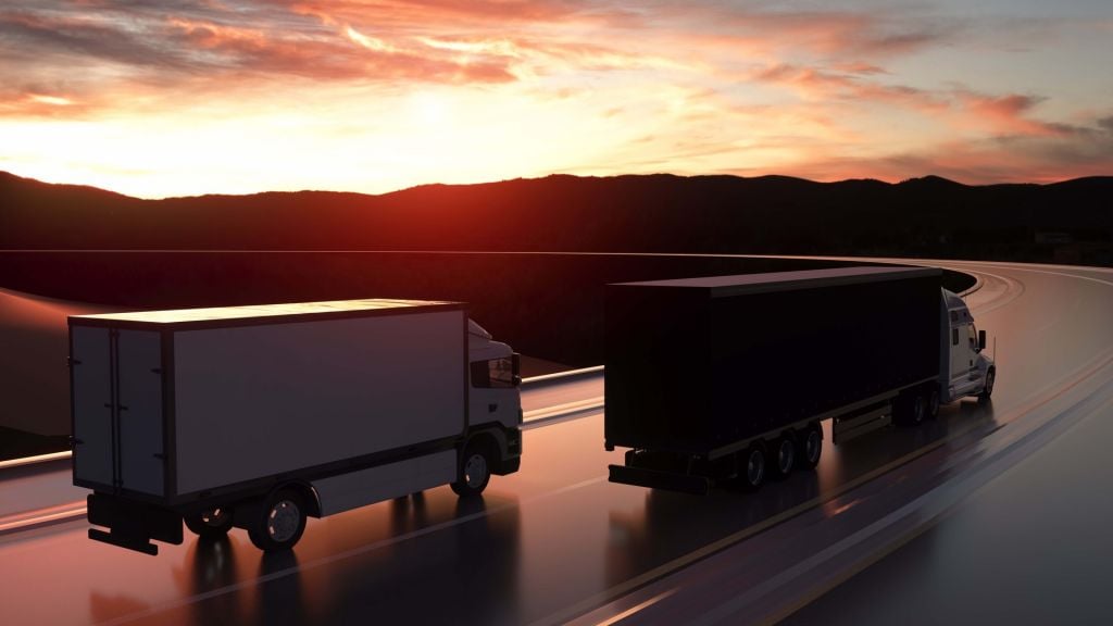 Two trucks on the road