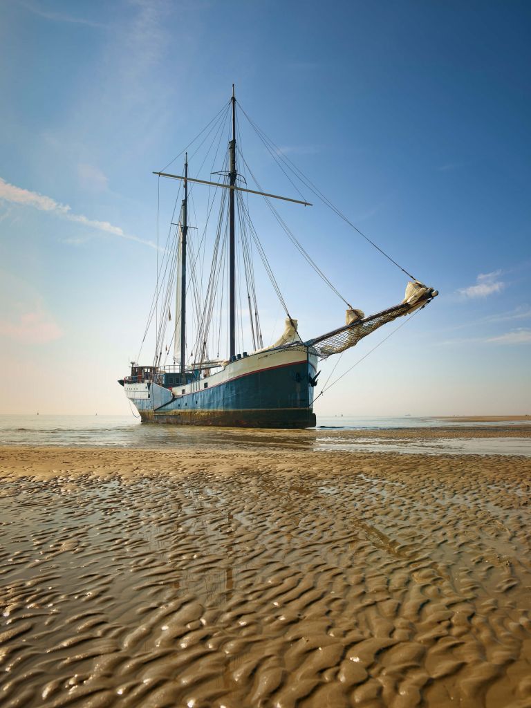 Ship on the mudflats