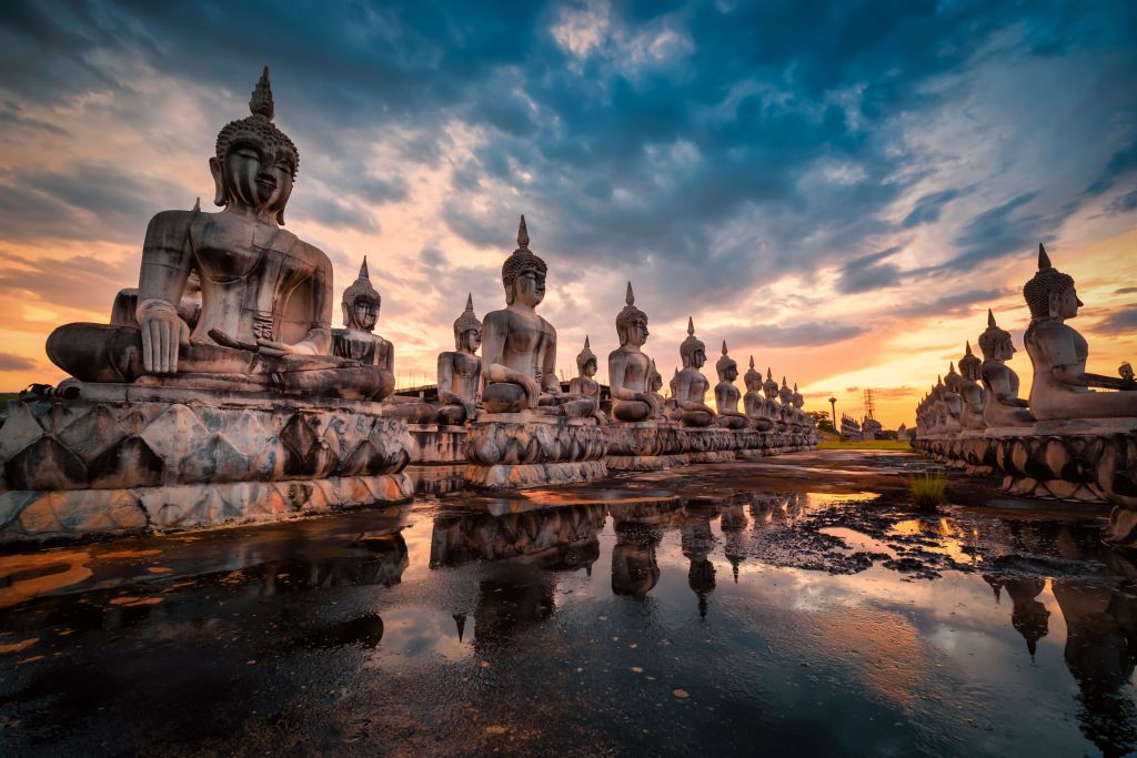 Buddha statues on water