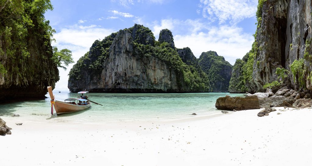 Long tail boat at island