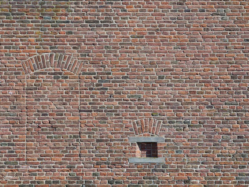Former window in brick wall