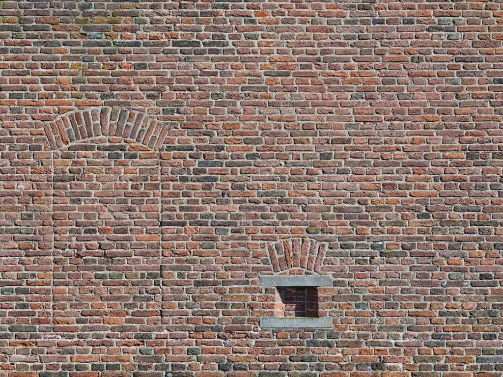 Former window in brick wall