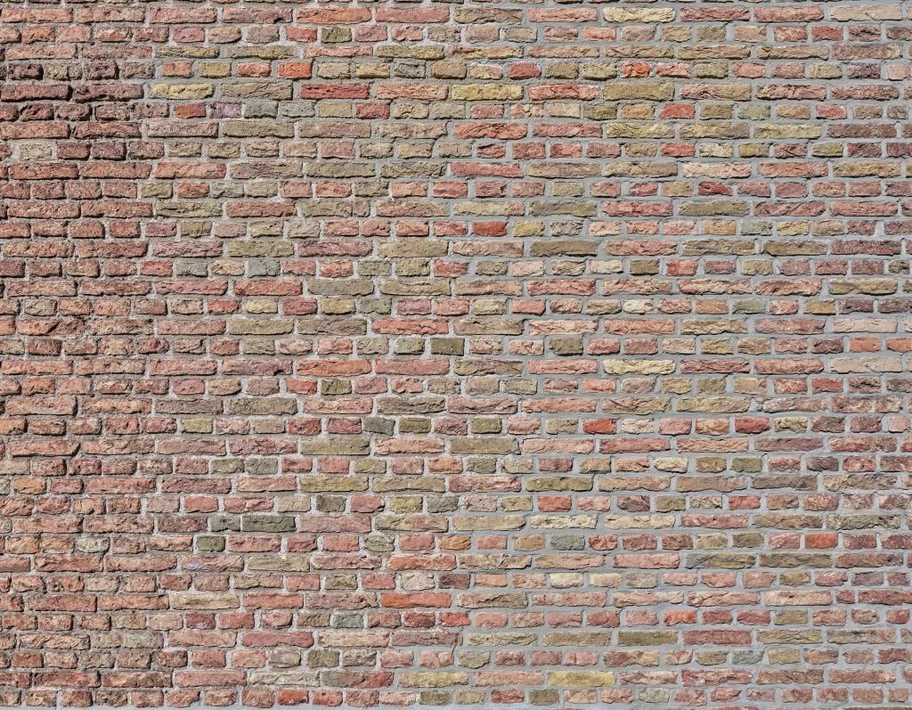 Brick wall with restored joints