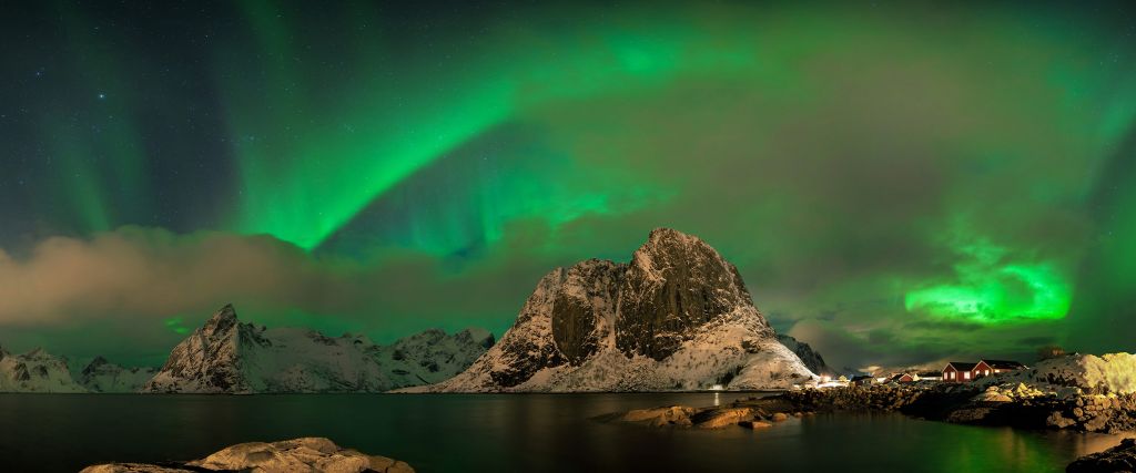 Northern lights above a high mountain