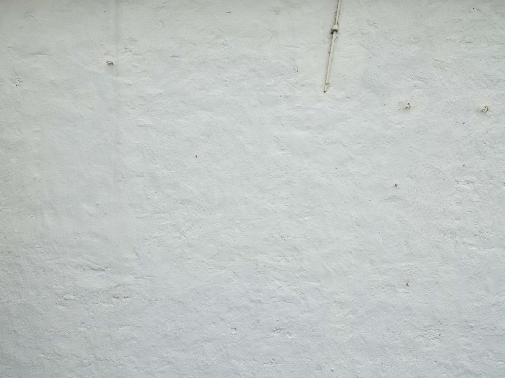 Wall with white stucco