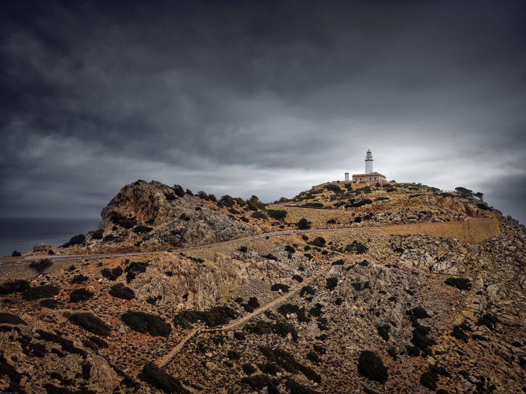 Lighthouse with storm clouds