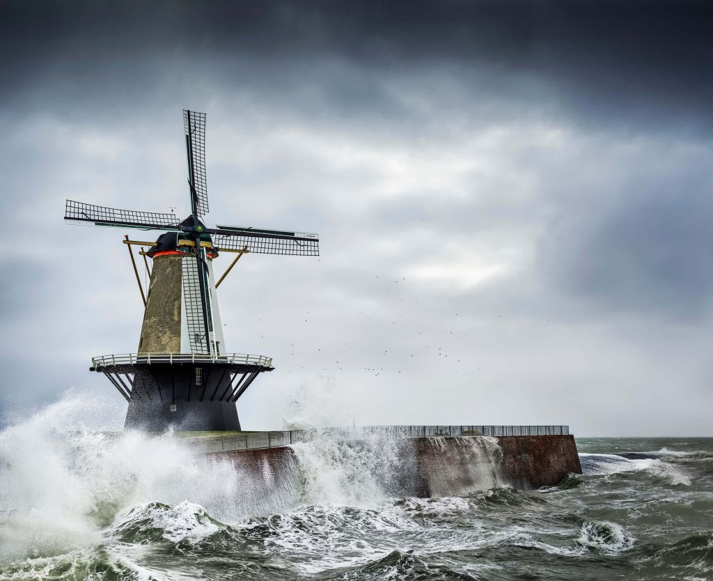 Mill with storm waves