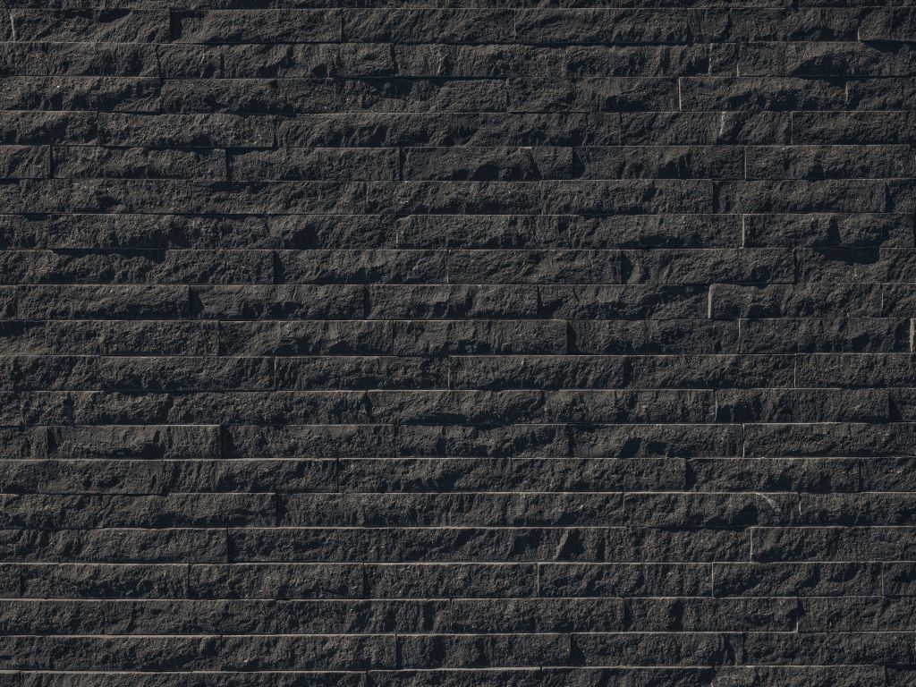 Wall with dark stones