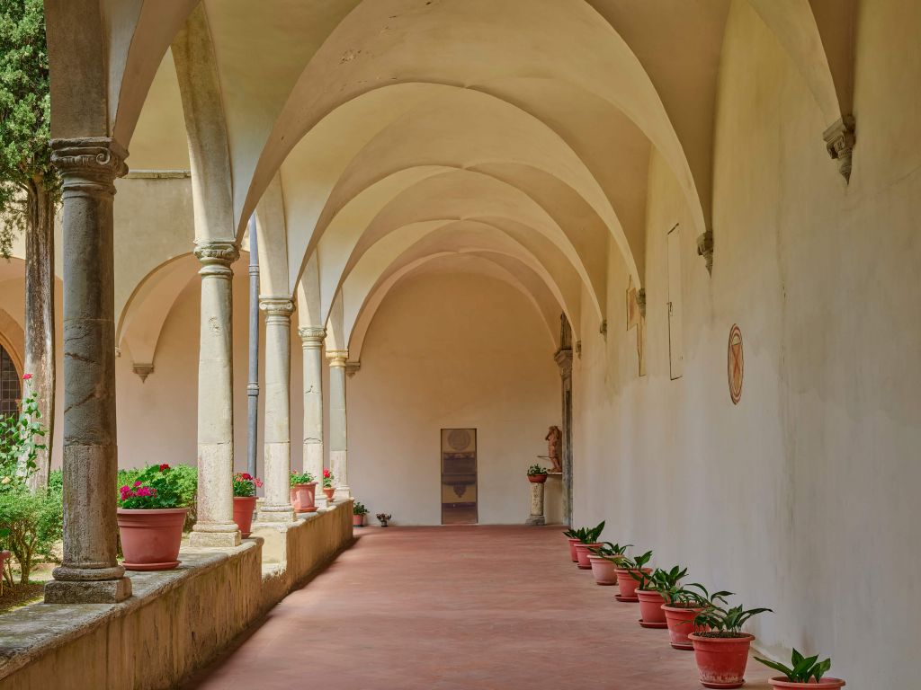Courtyard with arches and plants