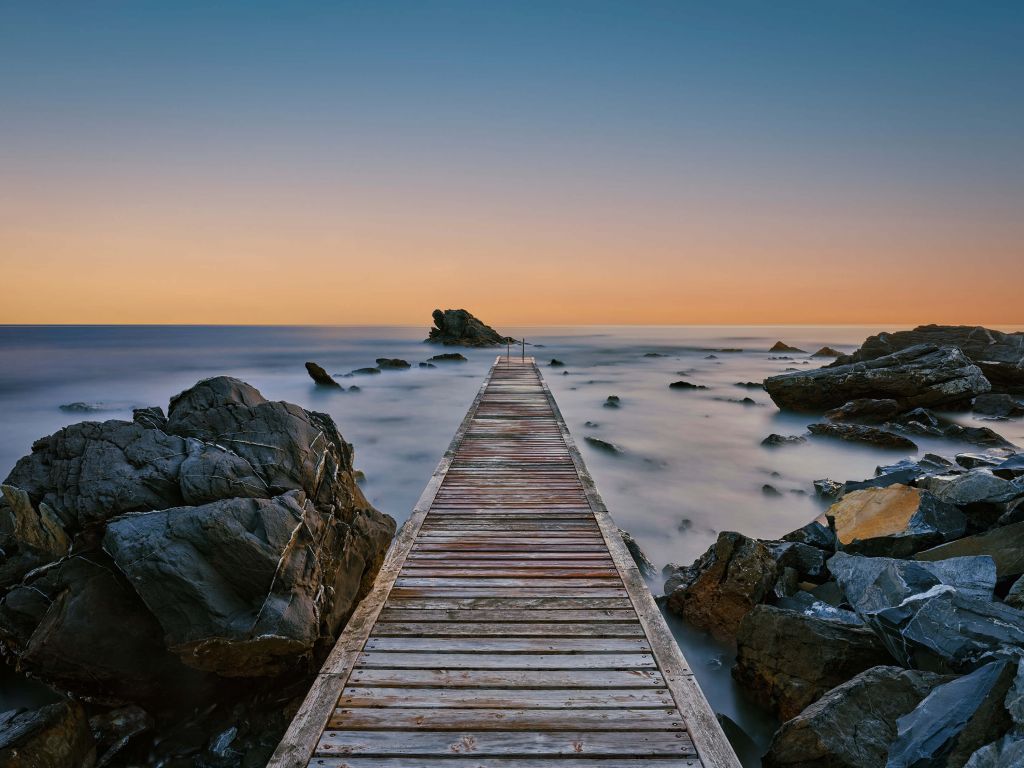 Jetty at rocky coast