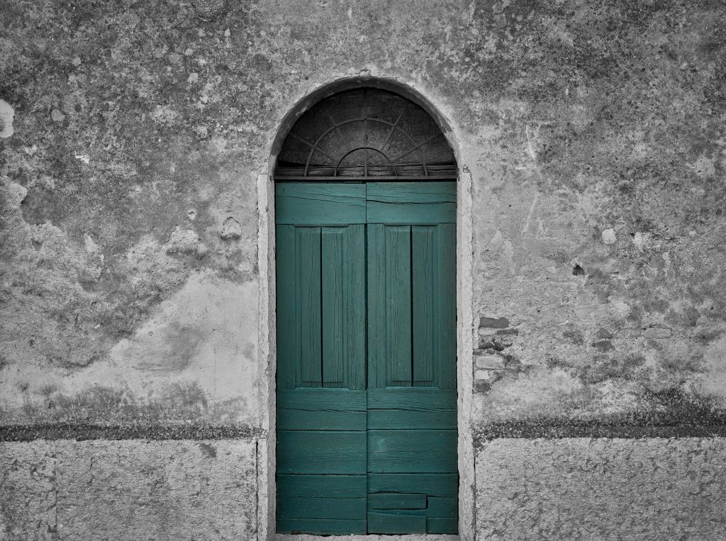 Green door in old wall