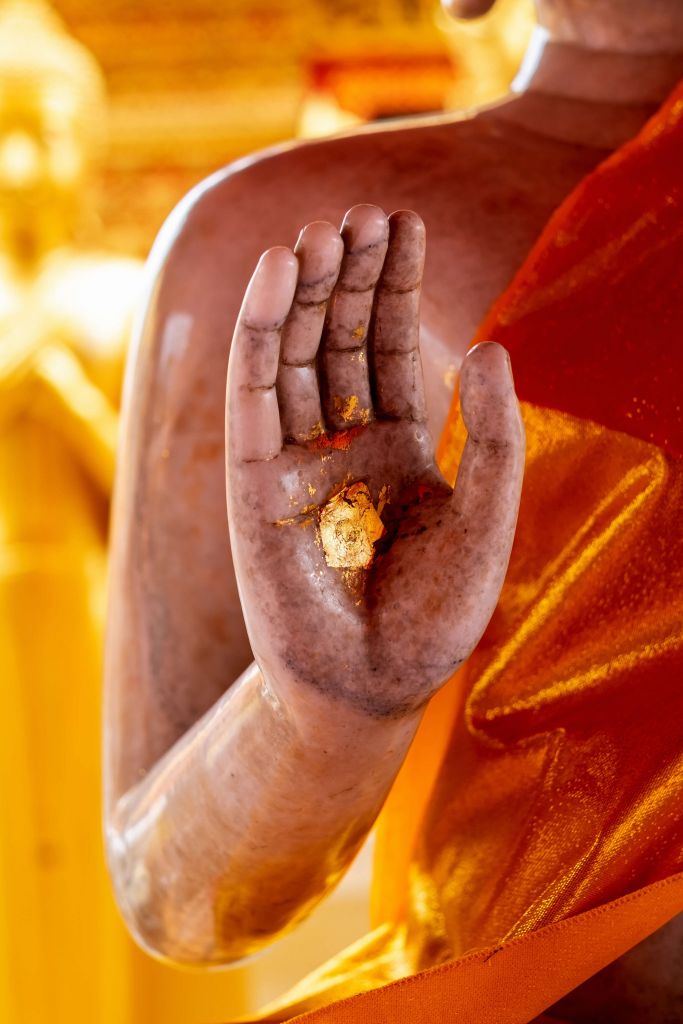 Palm with gold plaque Temple complex Bangkok (Thailand)  