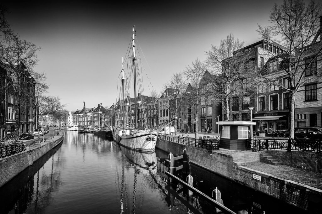 Historical ship located in the river A in Groningen In black and white 