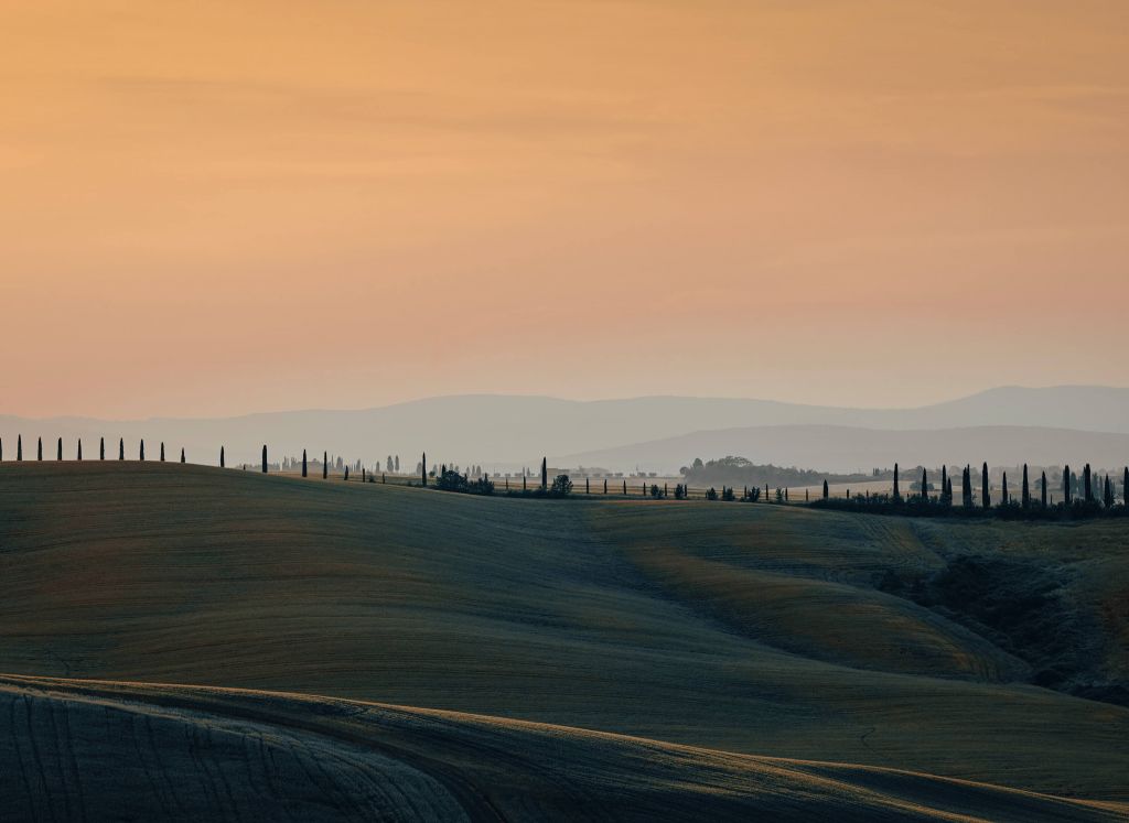 Orange glow over Italian landscape