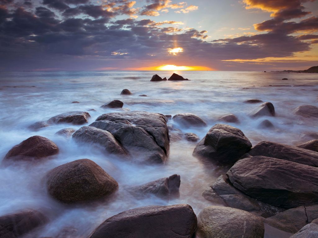 Sunset over a rocky coast