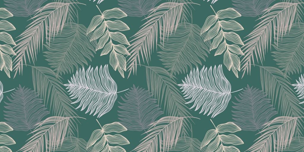 Palm leaf on green background