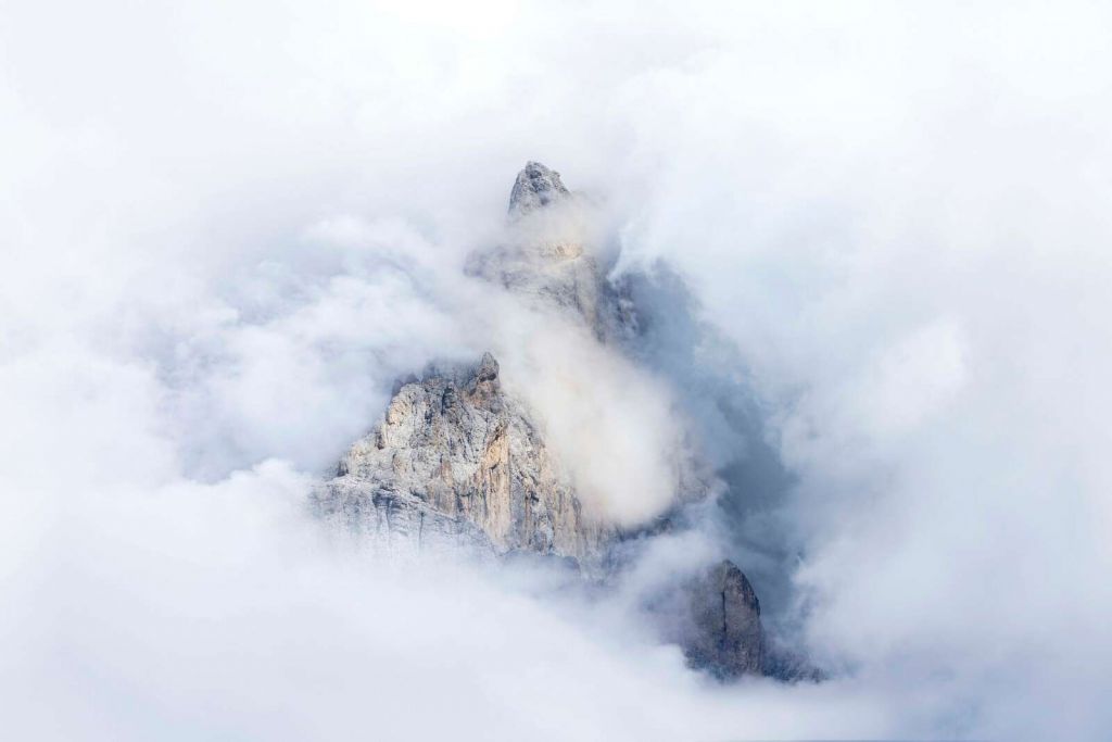 Hidden Mountain Peaks in the Mist