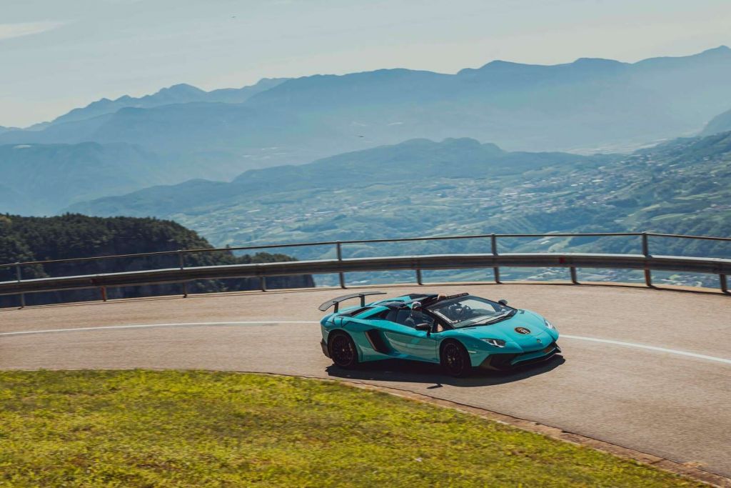 Alpine ride with luxury sports car