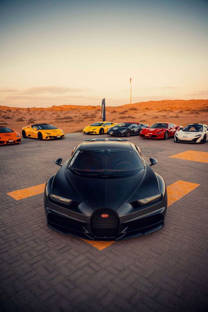 Hypercars at sunset