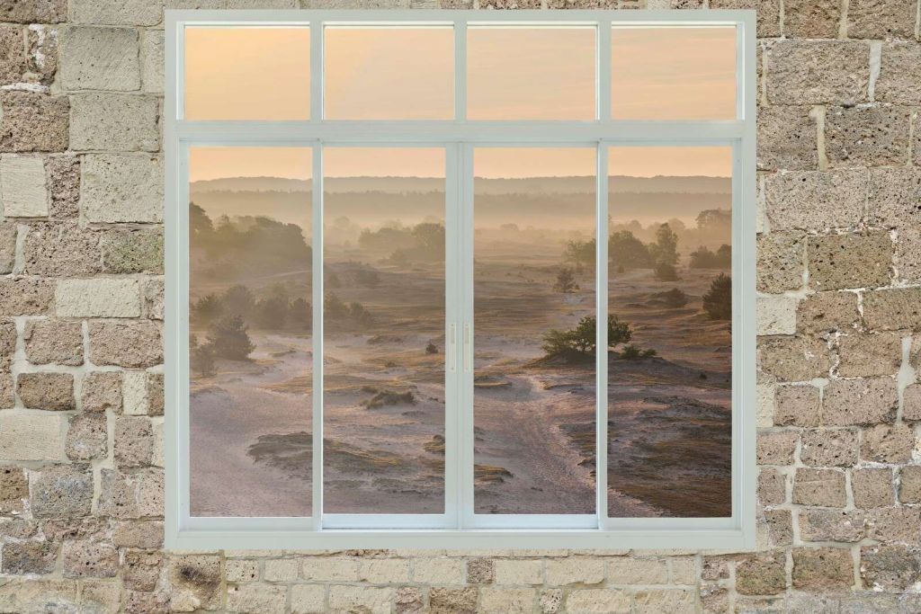 Sand drifting in morning mist
