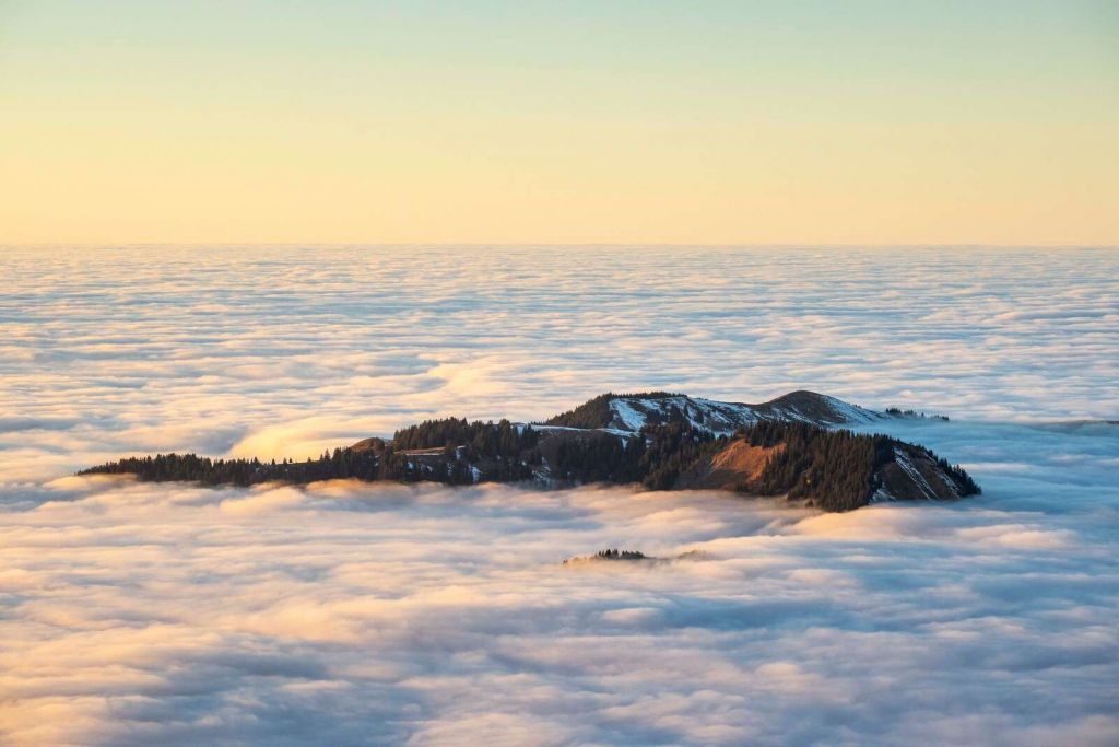 Mountain floating in a sea of clouds