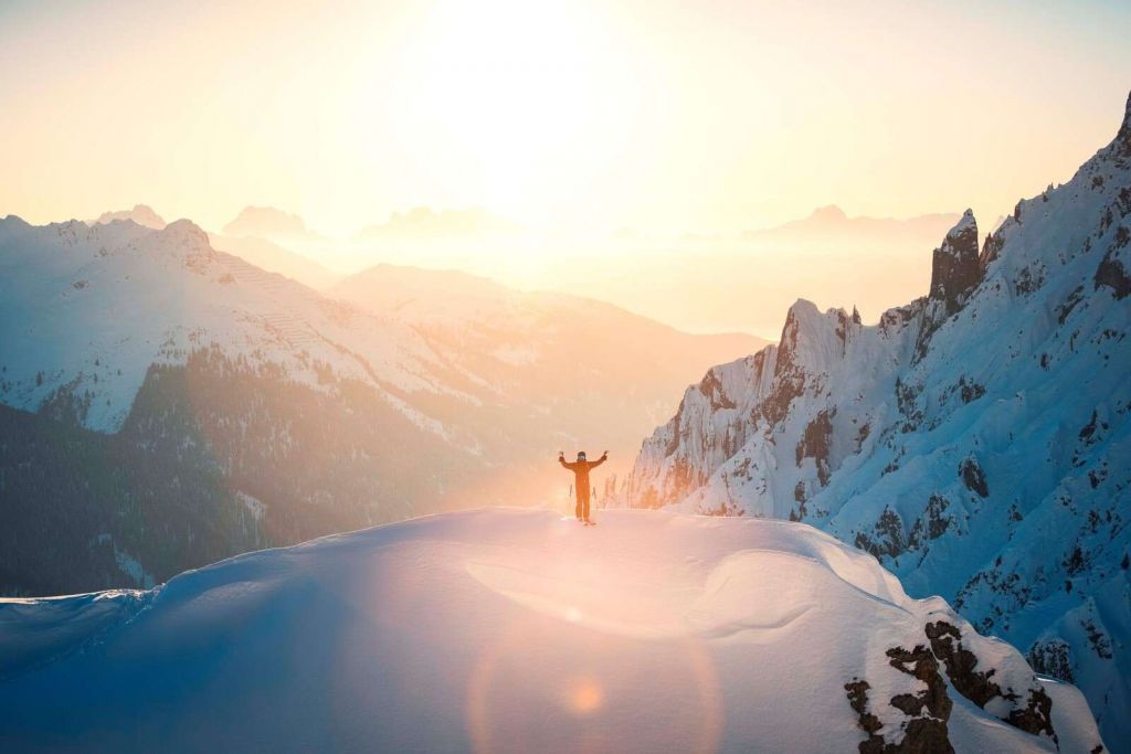 Sunrise above mountain peaks
