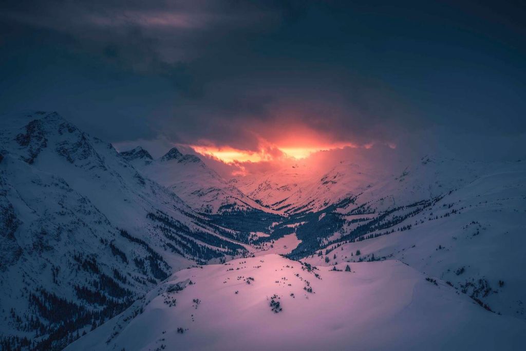 Evening glow above a quiet mountain valley