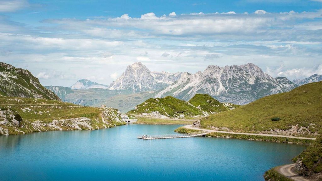 Bright mountain lake in summer valley