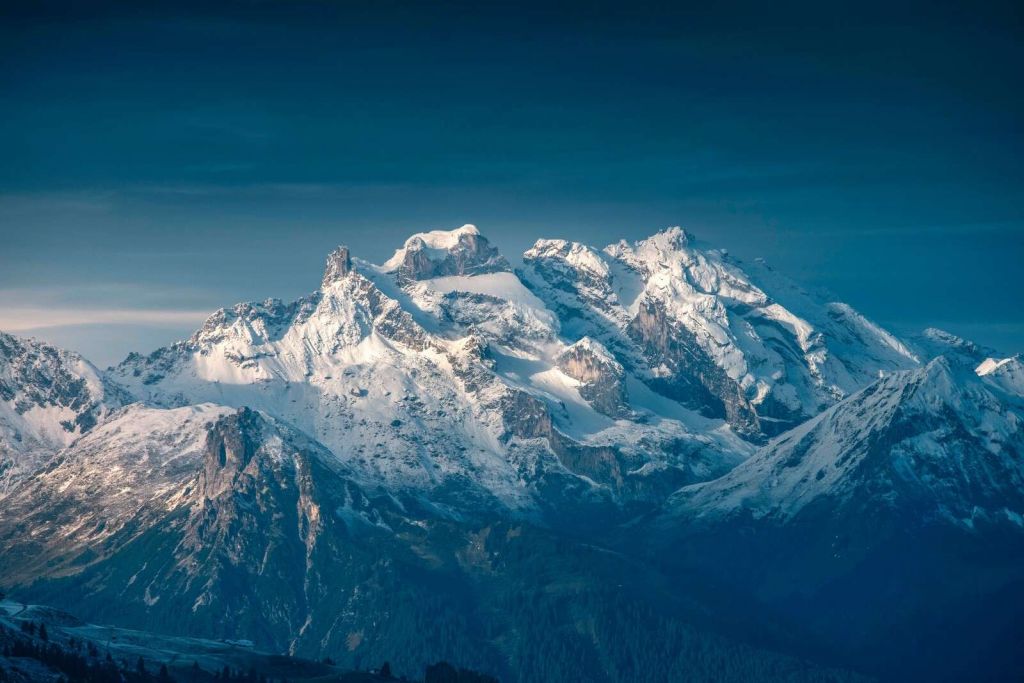 Crystal light over snow-capped peaks