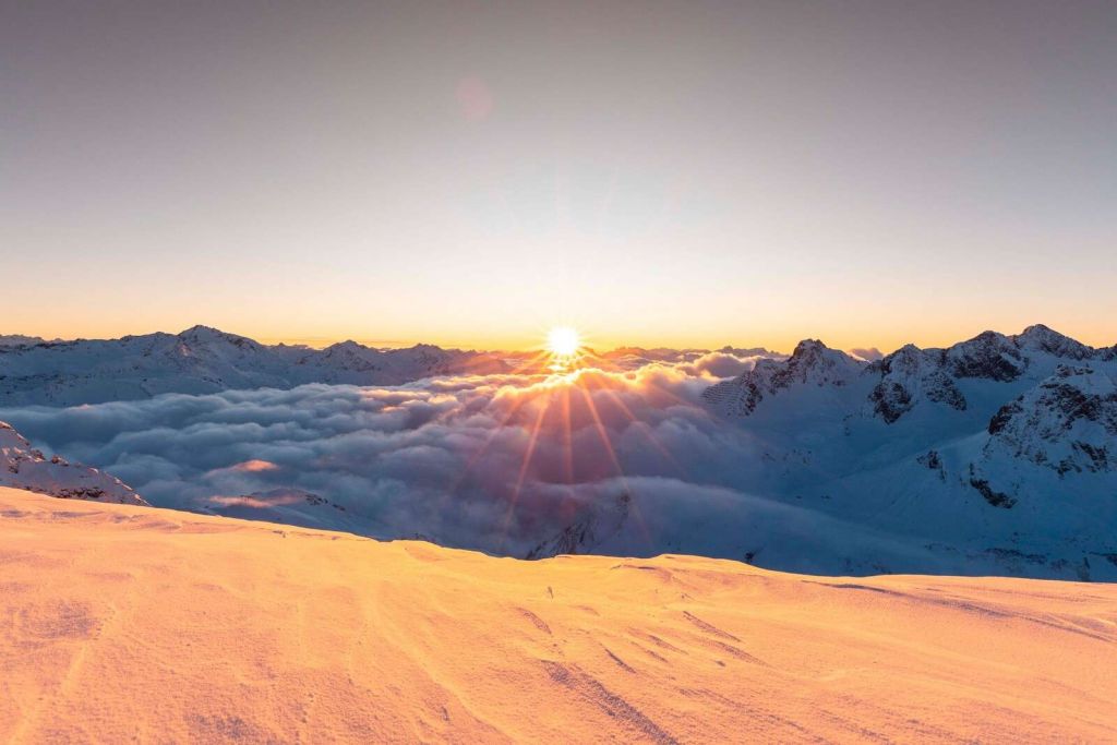 Sunlight above cloud cover in mountains