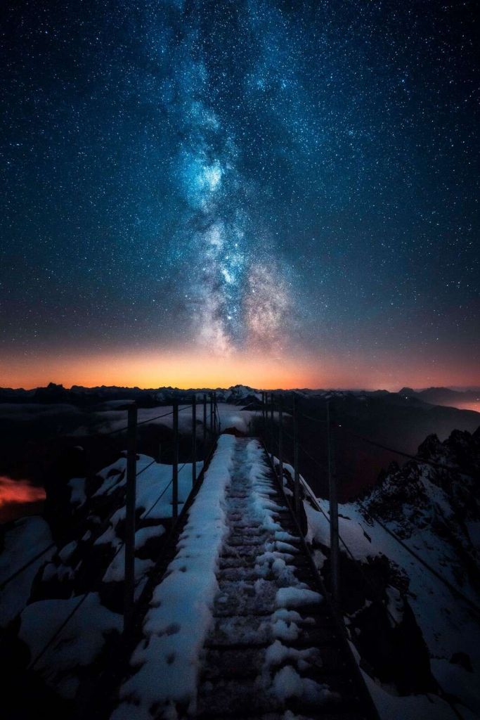 Star Path Over Snowy Mountain