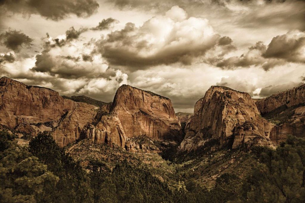 Storm clouds above red canyons