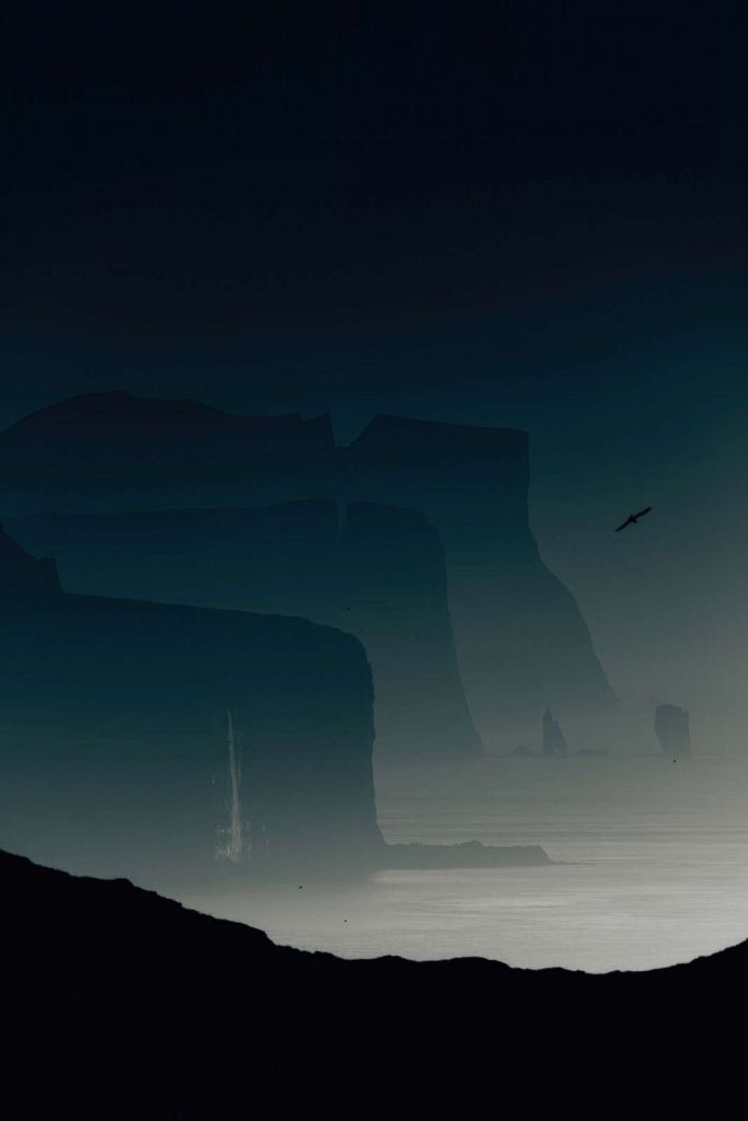 Cliffs in blue grey morning mist