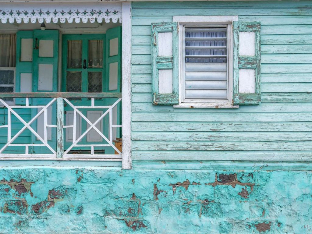 Turquoise wooden house facade