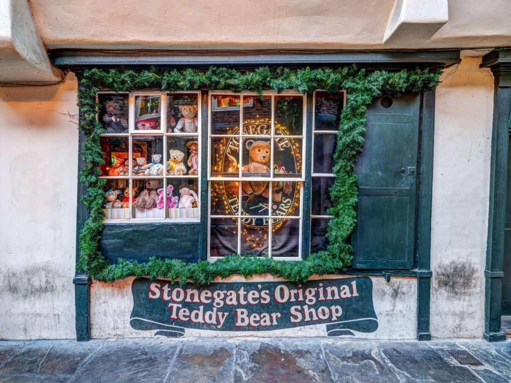 Nostalgic teddy bear shop with Christmas greenery