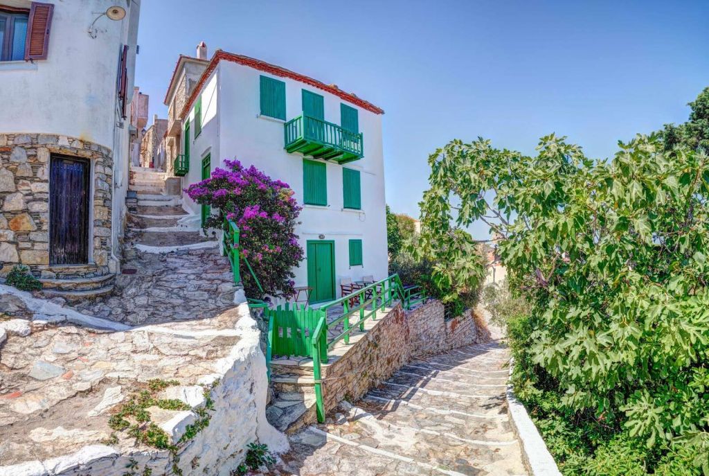 Mediterranean village with green shutters