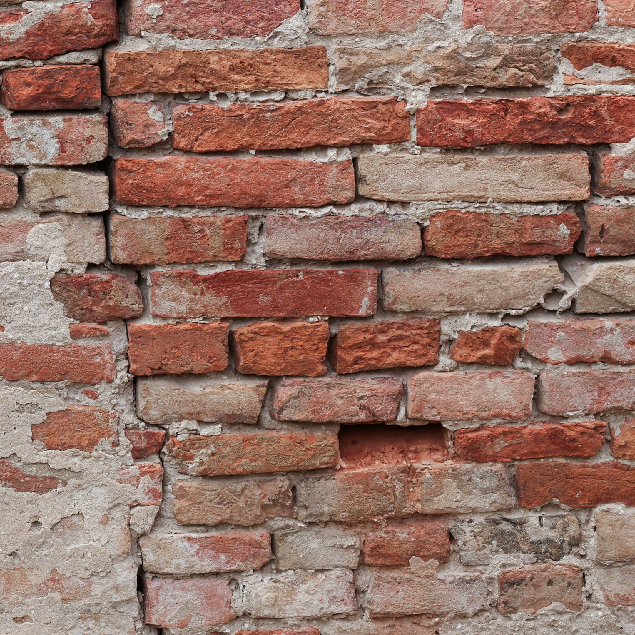 Crumbling brick wall Wallpaper