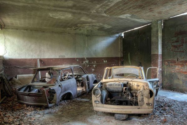 Abandoned garage with wrecks