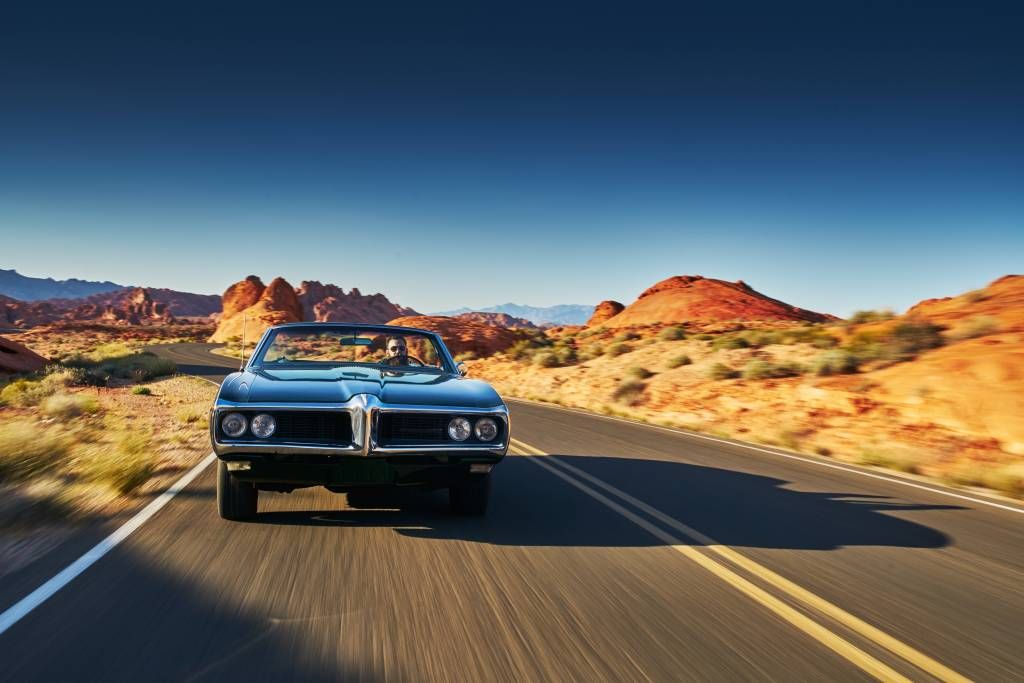 Muscle car in an American landscape main product photo