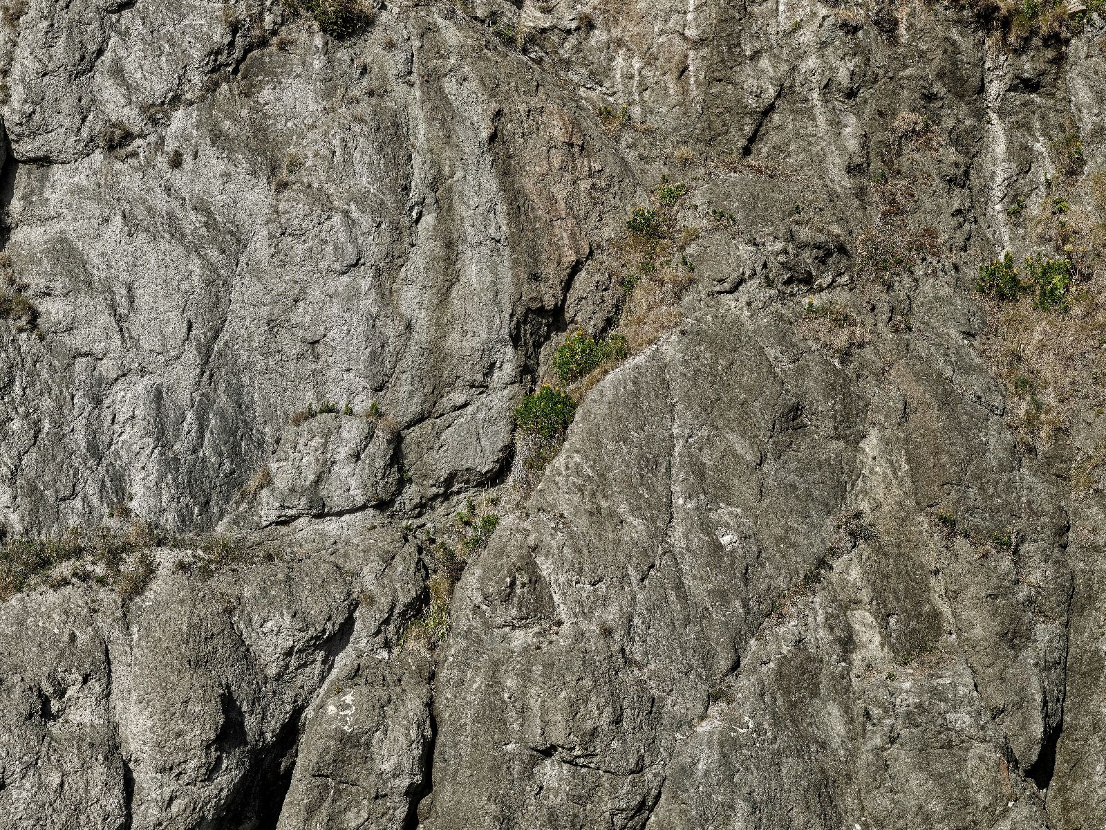 Grey rock face Grey rock face