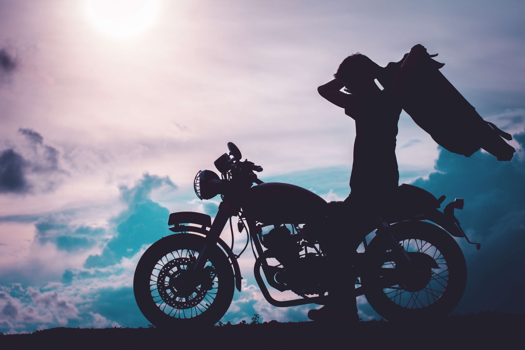 Silhouette motorcyclist