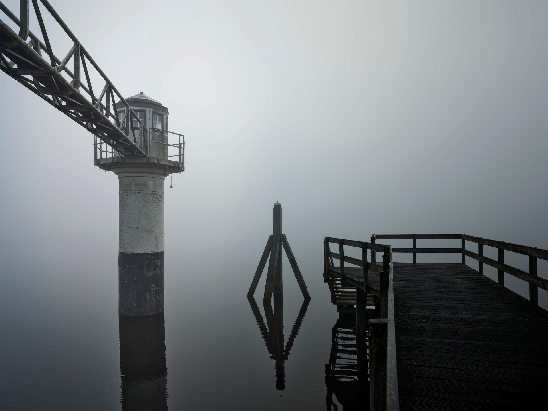 Havenlicht met peilschaal