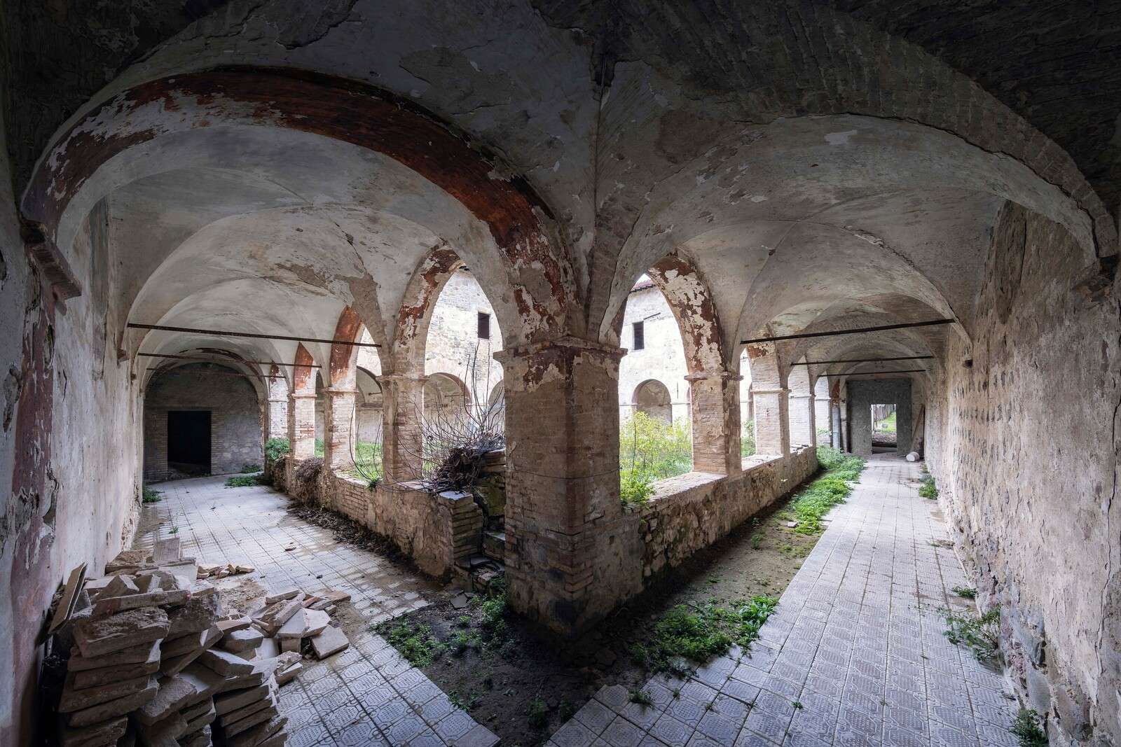 Abandoned Cloister Walk in Decay