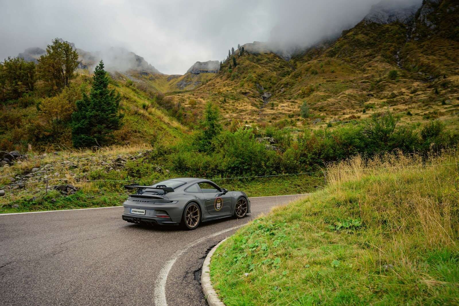 Sports car in mountain mist